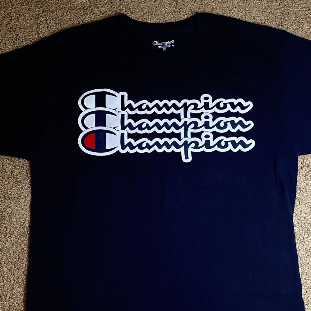 Champion Tee